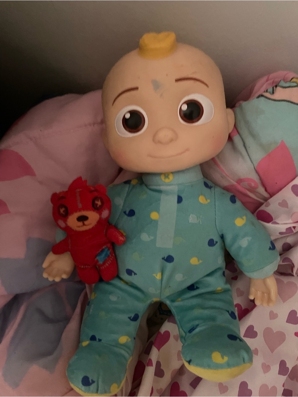 CoComelon Musical Bedtime JJ Doll that comes with a small Teddy Pillow Plush